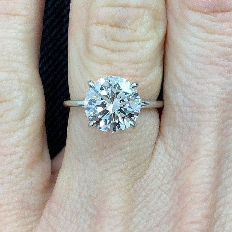 Diamond solitaire ring after cleaning with Sparklean spray, customer photo by Brian S. (Amazon, April 2024)